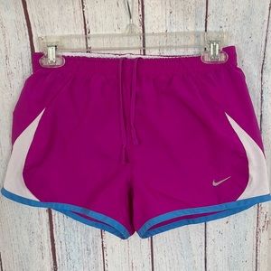 Purple and white Nike running shorts